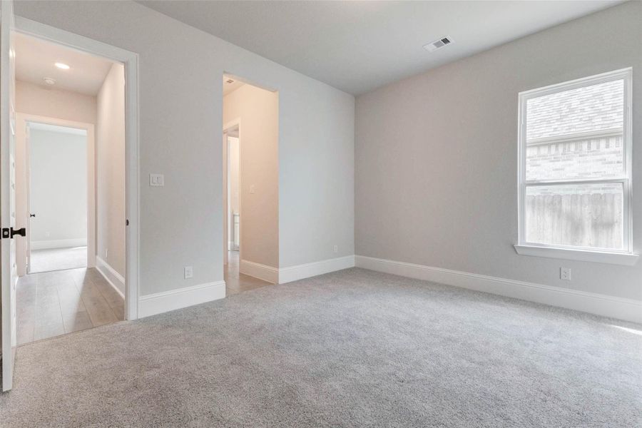 Spacious, unfurnished interior of a new home in Fulbrook on Fulshear Creek, Fulshear (Image 32).