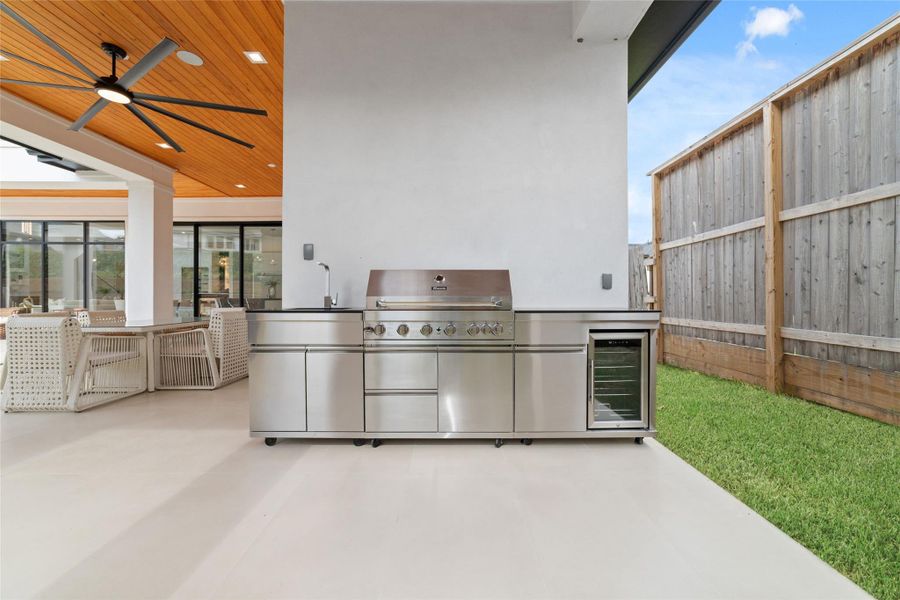Covered entertaining spaces invite gatherings throughout the year.
