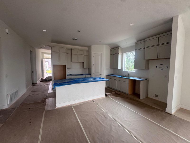 In-progress construction of a new home in Persimmon, Buda, TX (Image 8).