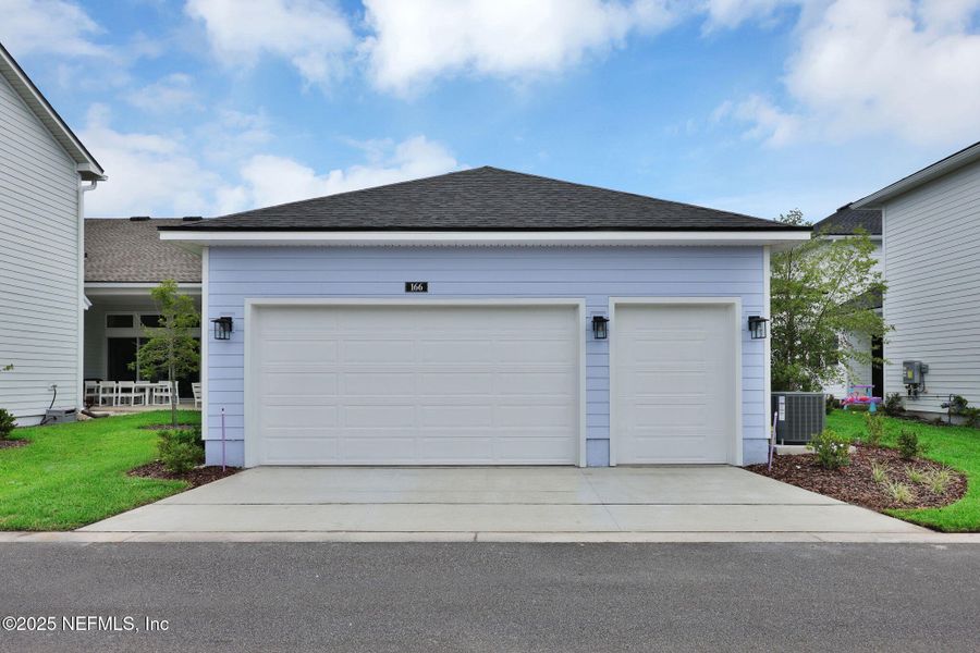 Front exterior of a new home in Seabrook Village at Seabrook, Nocatee, FL, highlighting curb appeal (Image 26).