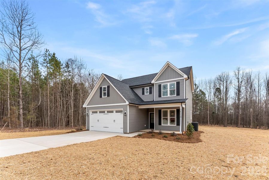 Front exterior of a new home in , New London, NC, highlighting curb appeal (Image 25).