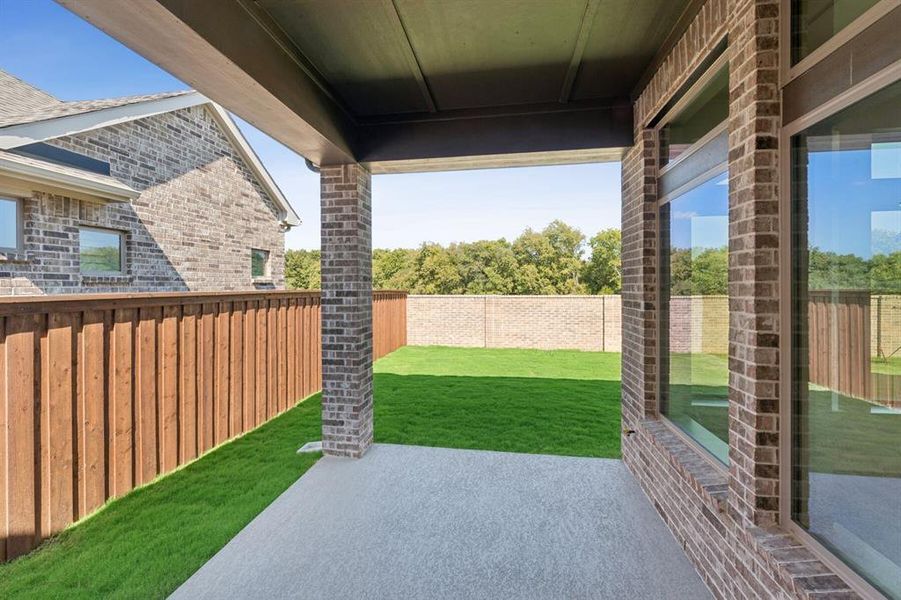 Exterior details and patio area of a home in South Pointe Cottage Series, Mansfield (Image 2). Exterior details and patio area of a home in South Pointe Cottage Series, Mansfield (Image 2).