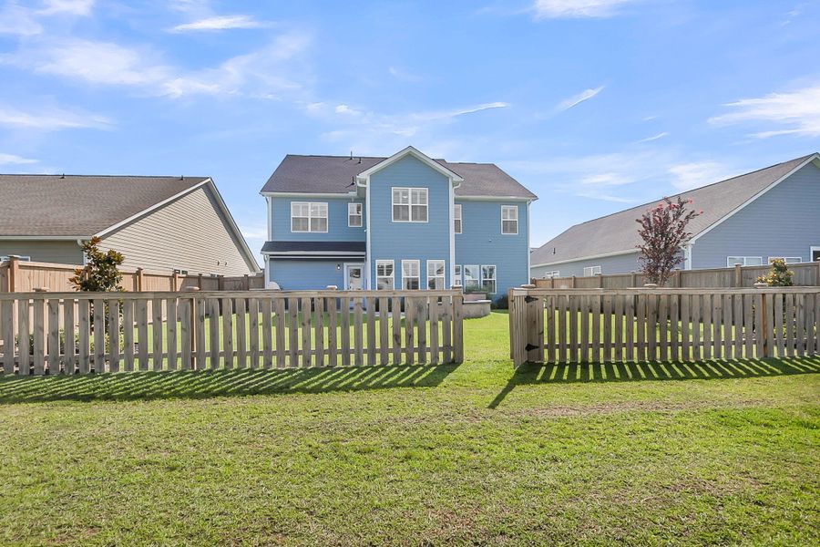 Exterior details and patio area of a home in Hewing Farms, Summerville (Image 25).