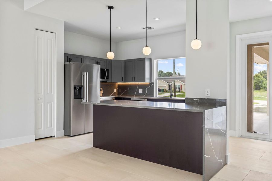 Furnished interior view inside a new home in , Port St. Lucie (Image 8).