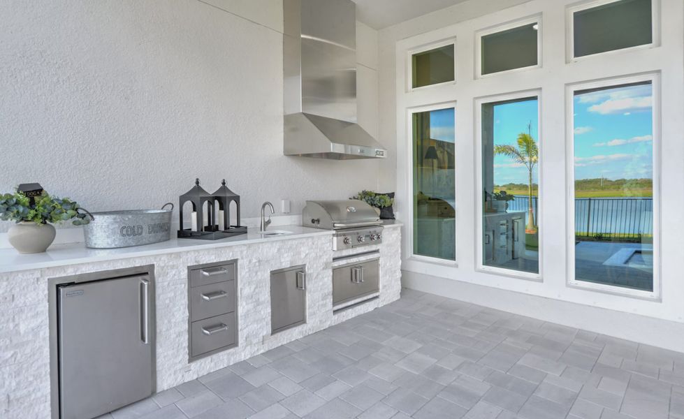 Exterior details and patio area of a home in Waterset, Apollo Beach (Image 27).
