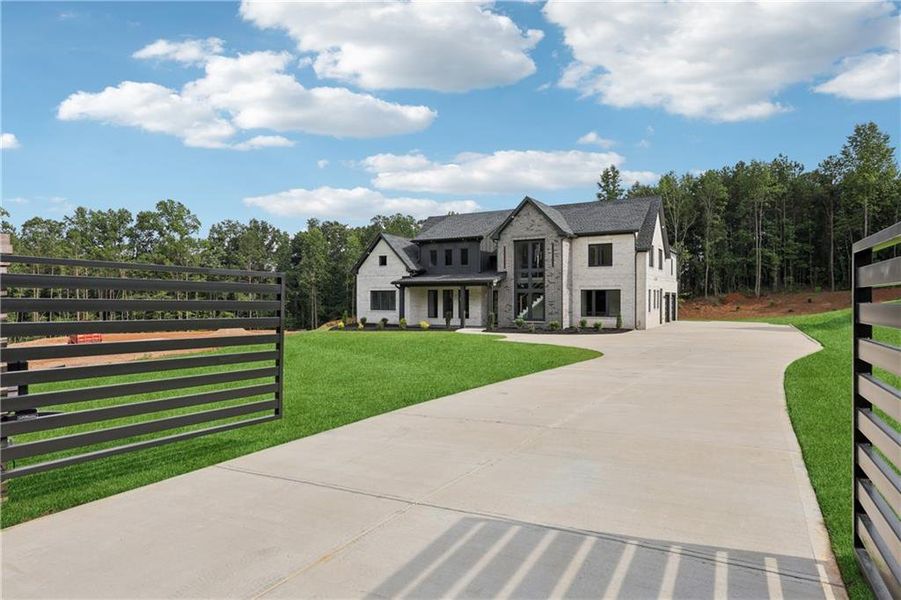 Front exterior of a new home in , Braselton, GA, highlighting curb appeal (Image 37).