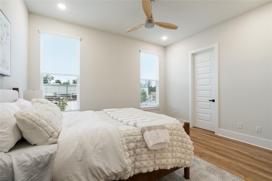 Designed with both scale and practicality in mind, this secondary bedroom includes a walk-in closet for seamless organization. Designed with both scale and practicality in mind, this secondary bedroom includes a walk-in closet for seamless organization.