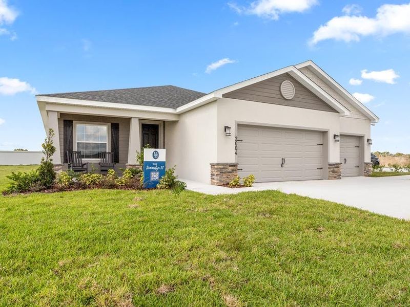 Multiple exterior elevations and paint schemes are available to choose from - Summerlyn II by Highland Homes
