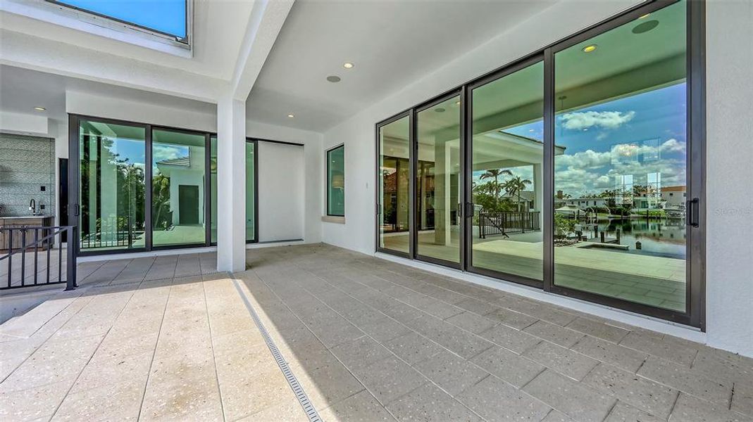 Exterior details and patio area of a home in , Longboat Key (Image 39).