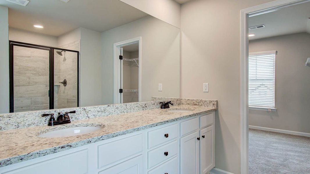 Representative furnished interior of a home built from the Vickery by DRB Homes in Berkeley Lakes, Locust Grove (Image 17).