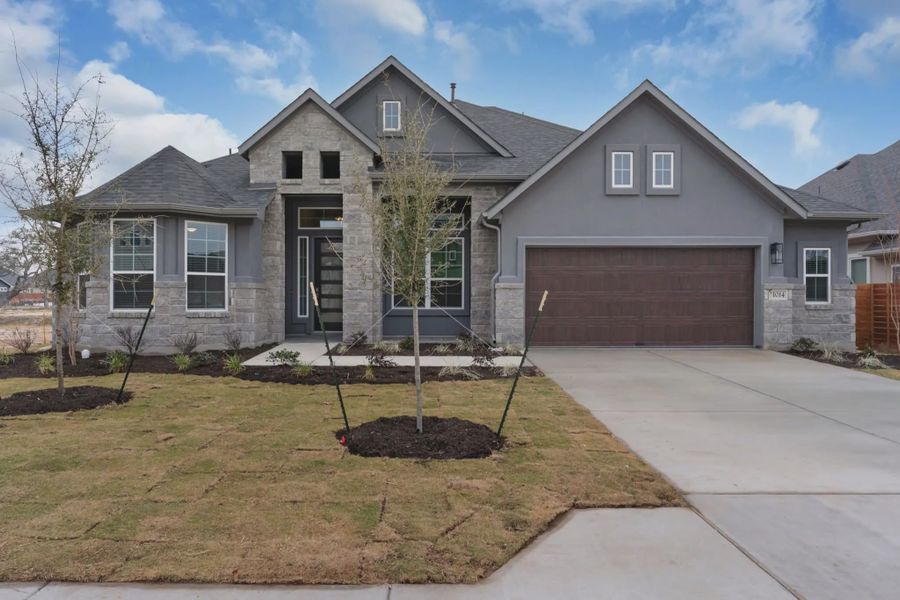 Representative exterior photo of a completed home built from the Aiden by Chesmar Homes in Broken Oak, Georgetown, TX (Image 1). Representative exterior photo of a completed home built from the Aiden by Chesmar Homes in Broken Oak, Georgetown, TX (Image 1).