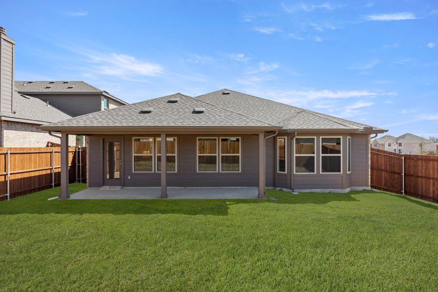 Representative exterior photo of a completed home built from the Lincoln by Impression Homes in Northspur, Terrell, TX (Image 23).