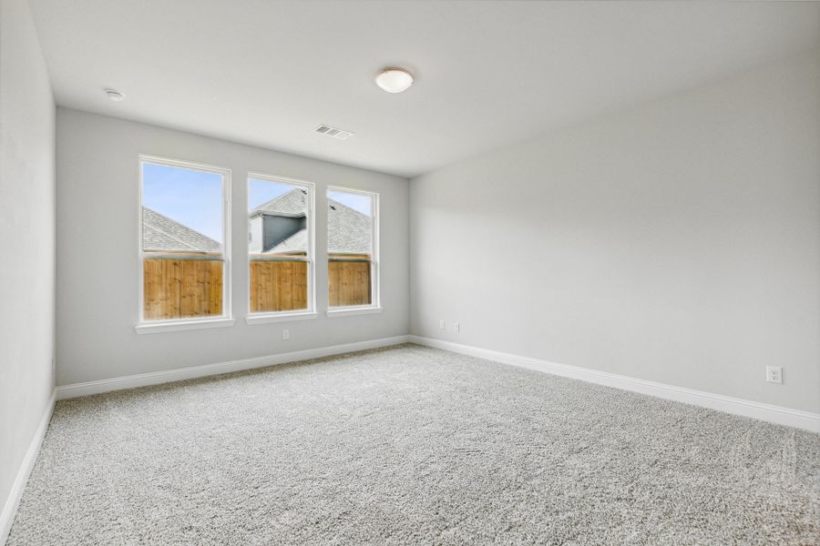 Representative unfurnished interior of a home built from the Lyla by Megatel Homes in Santorini, Seagoville (Image 11).