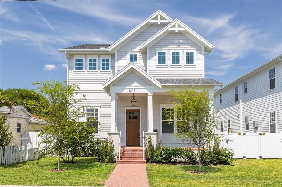 Front exterior of a new home in , St. Petersburg, FL, highlighting curb appeal (Image 23).