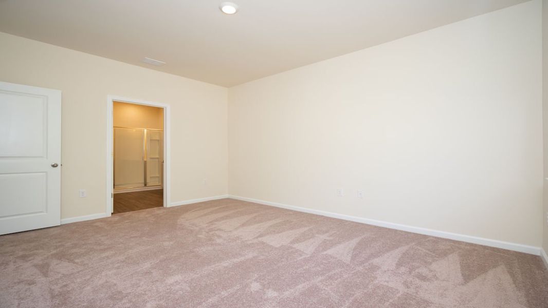 Representative unfurnished interior of a home built from the CALI by D.R. Horton in The Reserve at Wild Horse, Conway (Image 29).