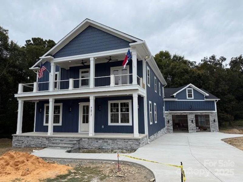 Front exterior of a new home in , Monroe, NC, highlighting curb appeal (Image 23). Front exterior of a new home in , Monroe, NC, highlighting curb appeal (Image 23).