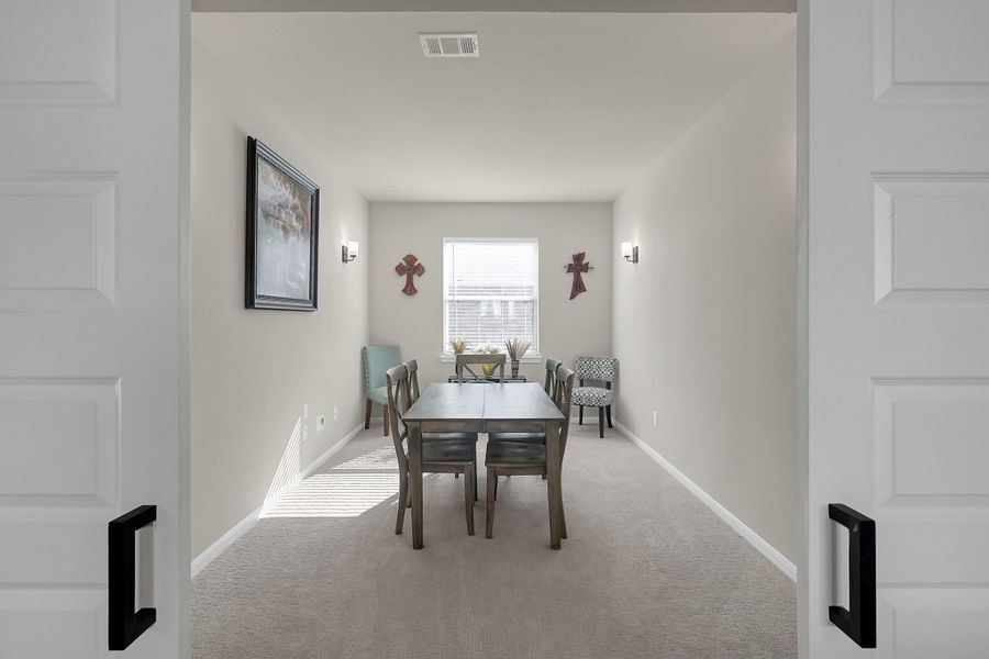 Flex room located off the living room would be great for a formal dining space/media room/office, etc. The options for this space are endless.