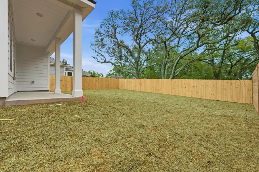 Exterior details and patio area of a home in Live Oak Cottages, Freeport (Image 22). Exterior details and patio area of a home in Live Oak Cottages, Freeport (Image 22).