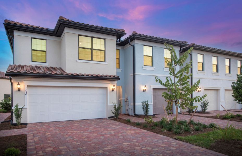 Front exterior of a new home in Sawgrass at Coral Lakes, Cape Coral, FL, highlighting curb appeal (Image 1).