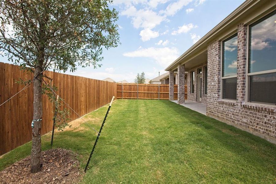 Exterior details and patio area of a home in Preserve at Honey Creek, McKinney (Image 17).