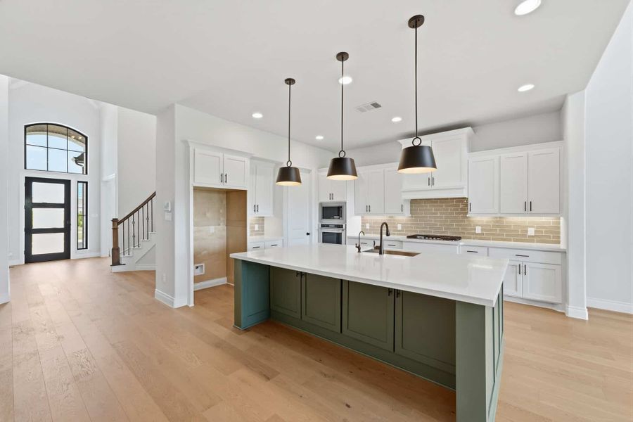 Furnished interior view inside a new home in Bridgeland 50′, Cypress (Image 9).