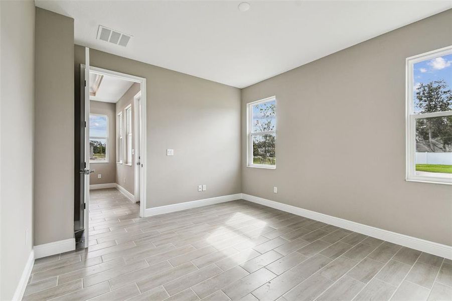 Spacious, unfurnished interior of a new home in Fairway Pointe - 55+ Villa Community, Sun City Center (Image 9).
