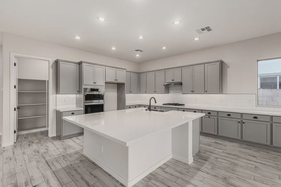 Furnished interior view inside a new home in Valencia at Granite Vista, Waddell (Image 6).