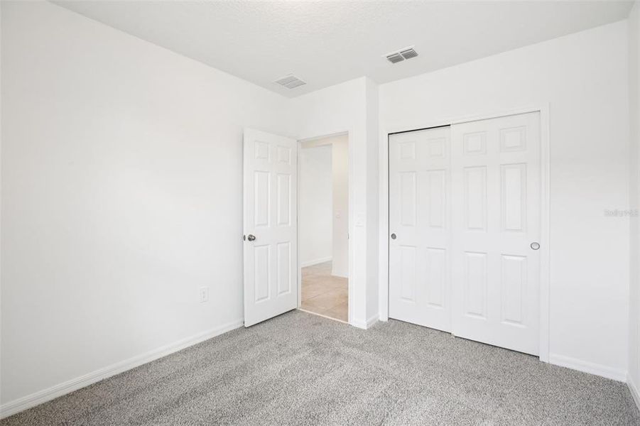 Spacious, unfurnished interior of a new home in Villamar - Classic Series, Winter Haven (Image 24).