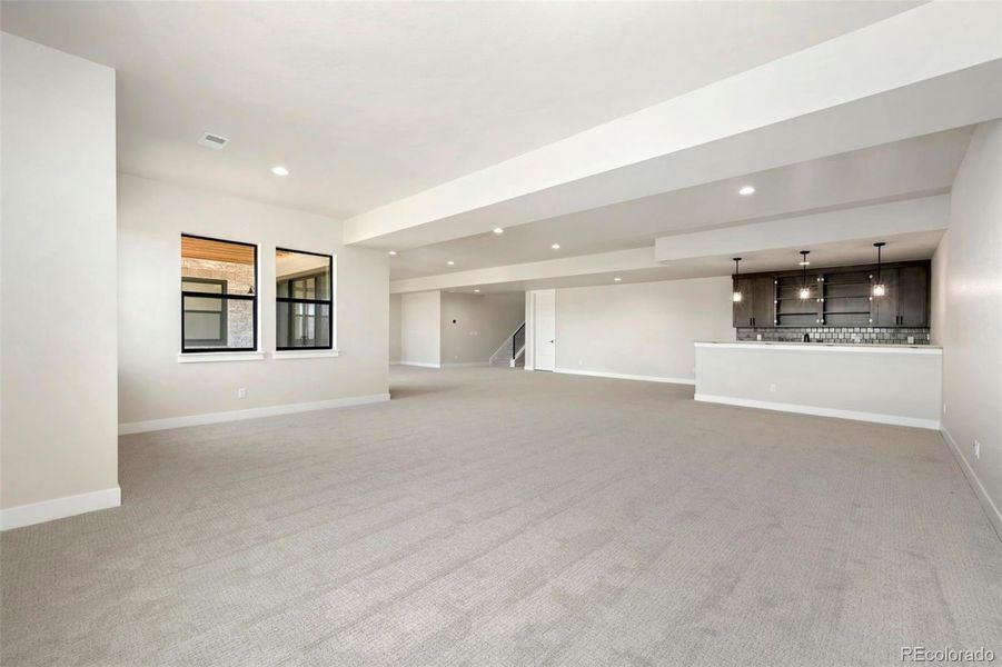 Spacious, unfurnished interior of a new home in The Fairways at RainDance, Windsor (Image 11).