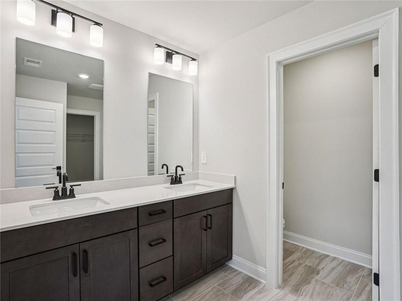 Furnished interior view inside a new home in Hemingway - Cottage Series, Cumming (Image 5).