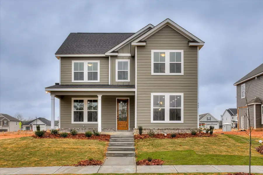 Front exterior of a new home in Tillery Park, Grovetown, GA, highlighting curb appeal (Image 2). Front exterior of a new home in Tillery Park, Grovetown, GA, highlighting curb appeal (Image 2).