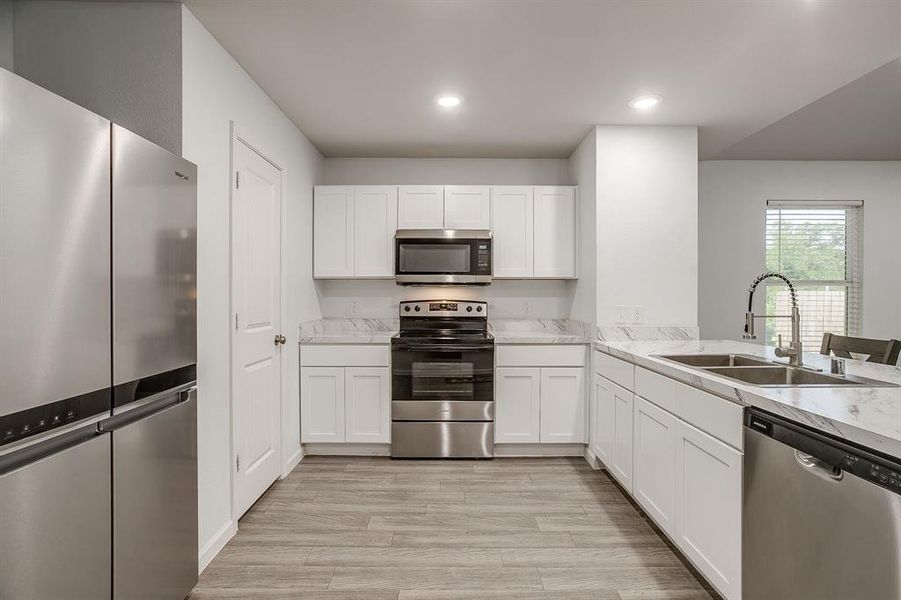 Furnished interior view inside a new home in Tolar Oaks, Tolar (Image 5).