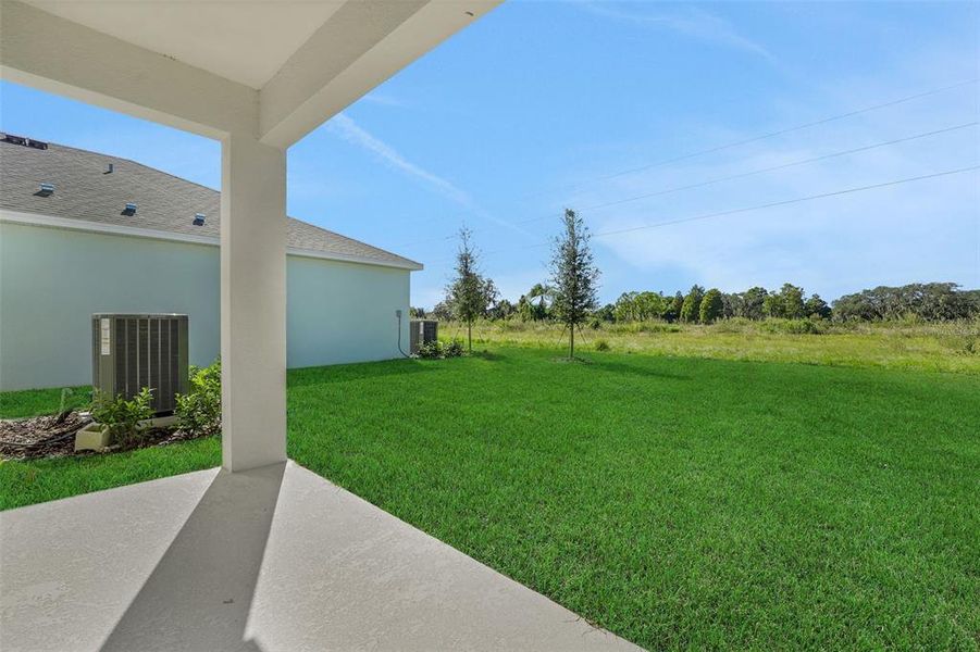 Exterior details and patio area of a home in Willowbrook North, Winter Haven (Image 24).