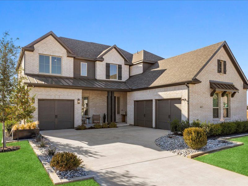 Representative exterior photo of a completed home built from the McKinney – Model Home by Windsor Homes in Brookshire at Legacy Hills, Celina, TX (Image 5).