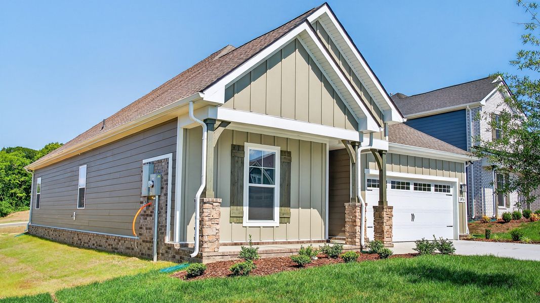 Front exterior of a new home in McClure Farms, Columbia, TN, highlighting curb appeal (Image 20). Front exterior of a new home in McClure Farms, Columbia, TN, highlighting curb appeal (Image 20).