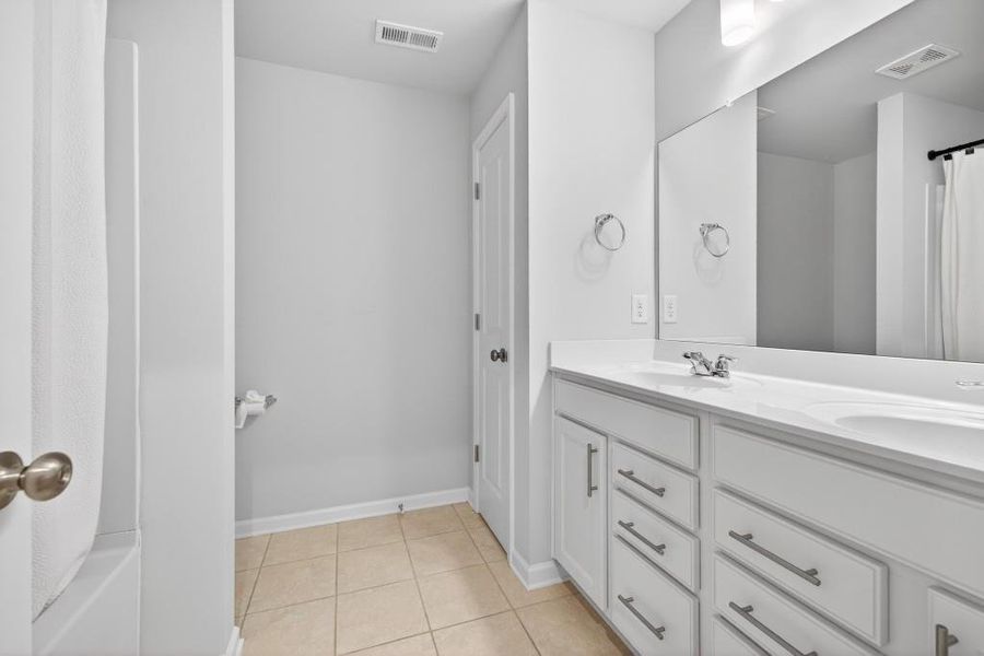 Furnished interior view inside a new home in Reunion, Flowery Branch (Image 12).