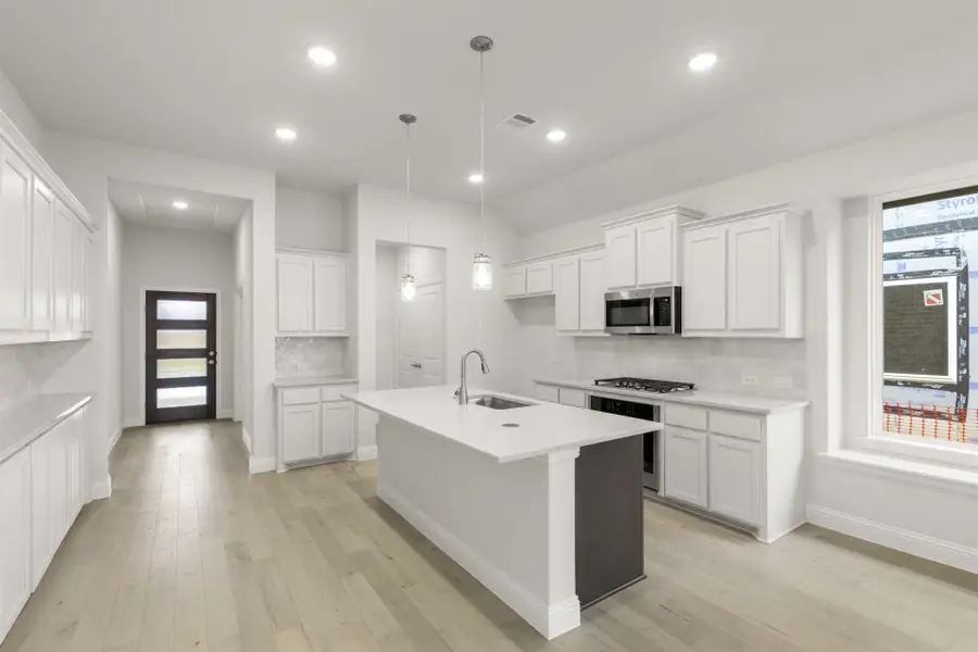 Furnished interior view inside a new home in La Terra at Uptown Celina, Celina (Image 3).