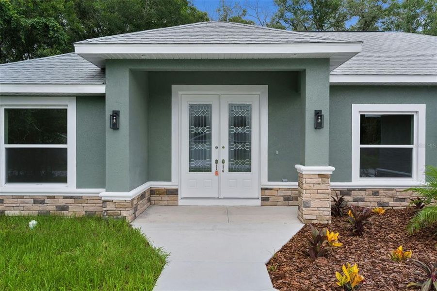 Exterior details and patio area of a home in , Summerfield (Image 25).