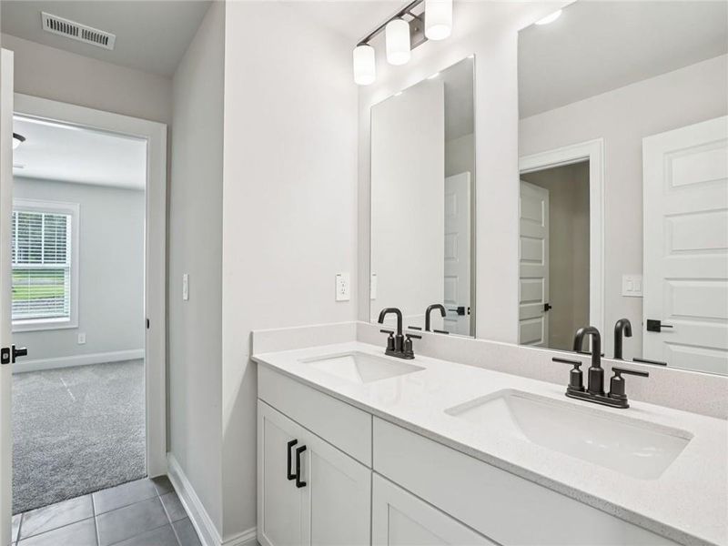 Furnished interior view inside a new home in Hemingway - Cottage Series, Cumming (Image 3).