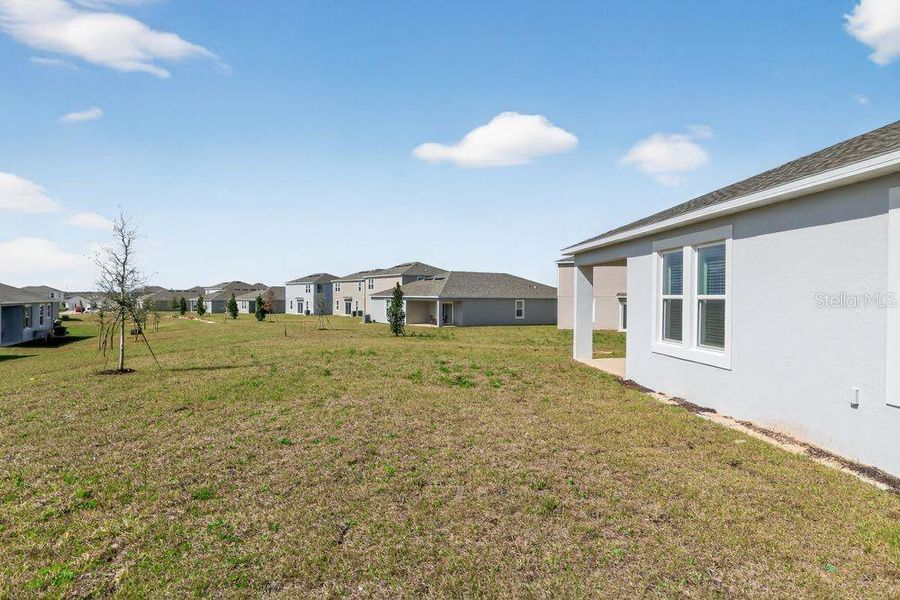 Exterior details and patio area of a home in Waterstone, Groveland (Image 23). Exterior details and patio area of a home in Waterstone, Groveland (Image 23).