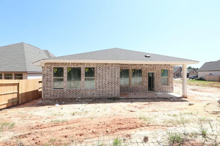 Front exterior of a new home in Escondido 60' Homesites, Magnolia, TX, highlighting curb appeal (Image 2).