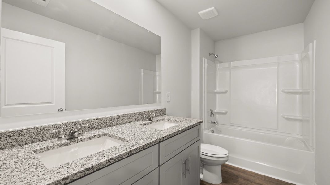Representative furnished interior of a home built from the Robie by D.R. Horton in Highland Hills, Graniteville (Image 10).