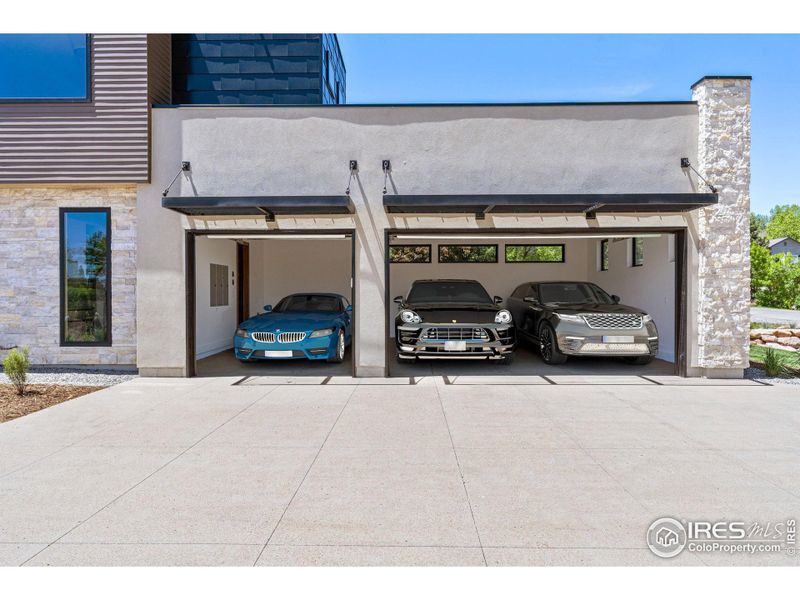 3 Car garage with glass panel doors