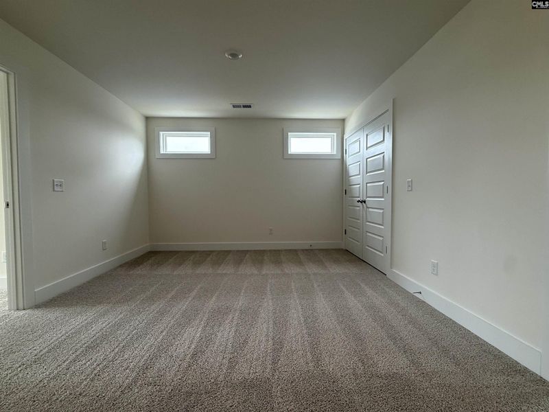 Spacious, unfurnished interior of a new home in Cottages at Roofs Pond, West Columbia (Image 34).