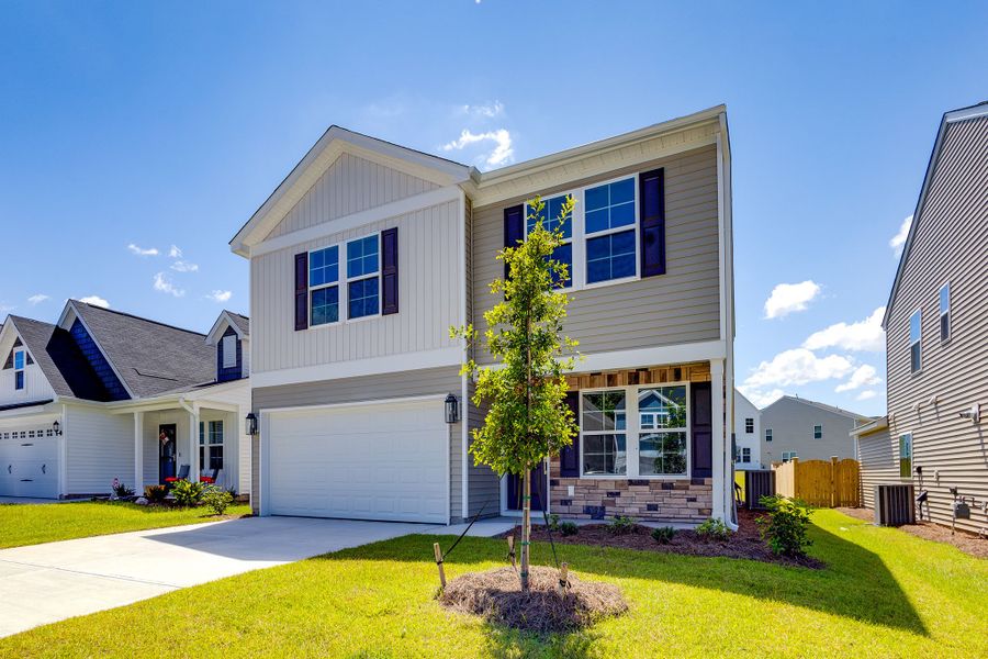Front exterior of a new home in Ellington, Elgin, SC, highlighting curb appeal (Image 20).