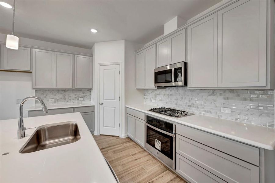 Furnished interior view inside a new home in Lilyana, Celina (Image 16).