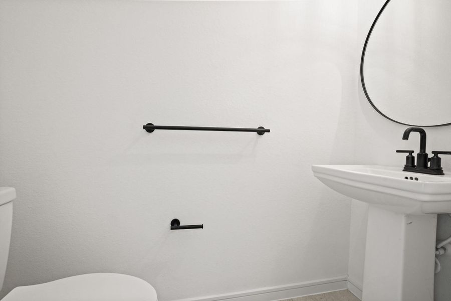 Half bath (*Photo not of actual home and used for illustration purposes only.) Half bath (*Photo not of actual home and used for illustration purposes only.)