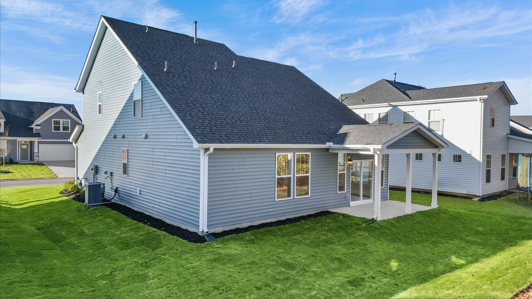 Warm and inviting outdoor living space with a covered rear porch and tasteful finishes Warm and inviting outdoor living space with a covered rear porch and tasteful finishes