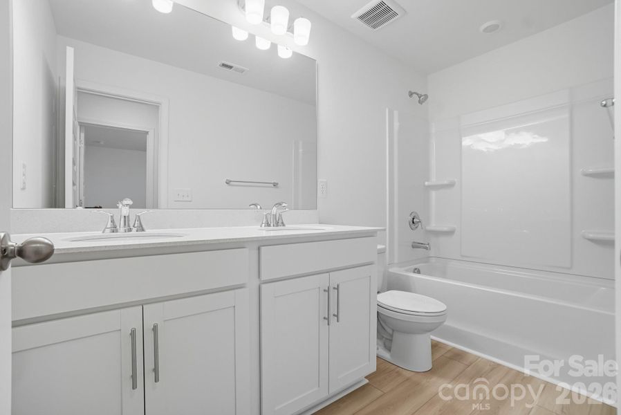 Furnished interior view inside a new home in Bellina, York (Image 12).