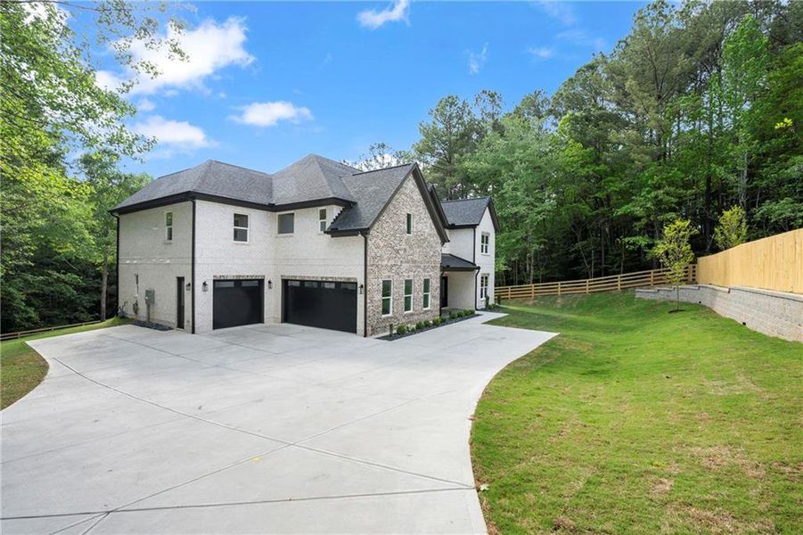 Front exterior of a new home in , Dacula, GA, highlighting curb appeal (Image 28). Front exterior of a new home in , Dacula, GA, highlighting curb appeal (Image 28).